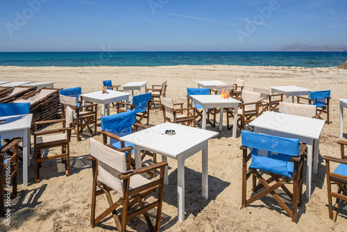 Romantic restaurant on the beach in the resort town of Mastichari on the island of Kos. Greece © vivoo