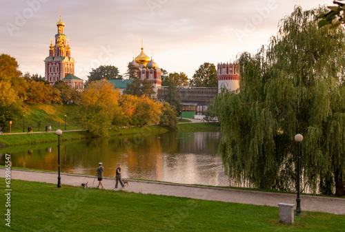 Moscow, Russia - August 12, 2022 : Novodevichy Monastery.The Cathedral in honor of the Smolensk icon of the Mother of God and the Church of the Intercession of the Most Holy Theotokos photo