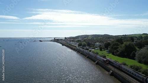 Wallpaper Mural River Exe, South Devon, England: DRONE VIEW: Two Intercity trains pass on the London Paddington-to-Penzance route close to Starcross railway station. South Devon is a popular UK holiday destination. Torontodigital.ca