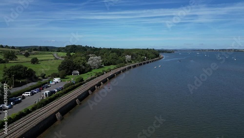 Wallpaper Mural Starcross, River Exe, South Devon, England: DRONE VIEWS: The River Exe with moored boats. To the left is the railway line (London Paddington - Penzance, Cornwall) and houses in Starcross village. Torontodigital.ca