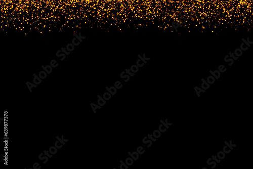 Colourful gold  yellow  orange and red glitter falling on black background.  New Year  Christmas and all celebration background concept. 