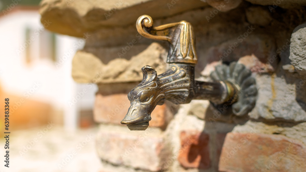 Metal drinking fountain with a faucet, water dispenser with metallic faucet, hydration station concept Metal drinking fountain with a faucet, water dispenser with metallic faucet, hydration station concept