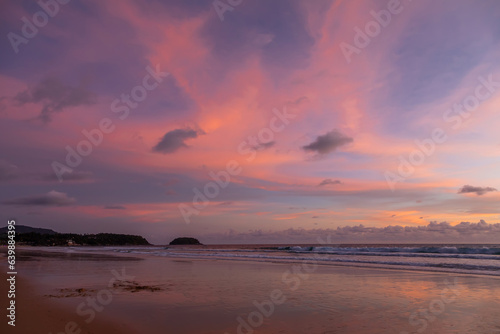 Beautiful and colorful sunset in Phuket. Long beach. Beautiful sea. Colorful sky.