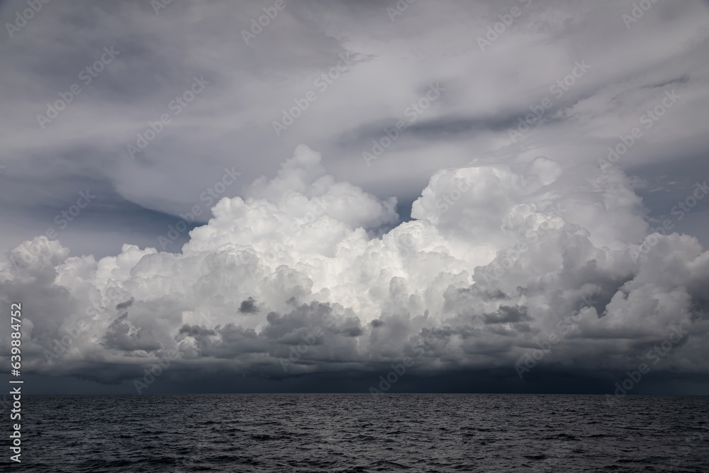 Cloudy weather at sea. Big storm over the ocean. Islands. Thunderclouds.