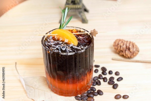 Cold brew peach or black coffee with peach. Fresh iced coffee.