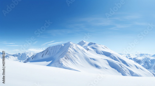 Wide angle view landscape of white snowy mountains range with clear blue sky during cold winter. Nature concept for extreme lifestyle product background © myboys.me