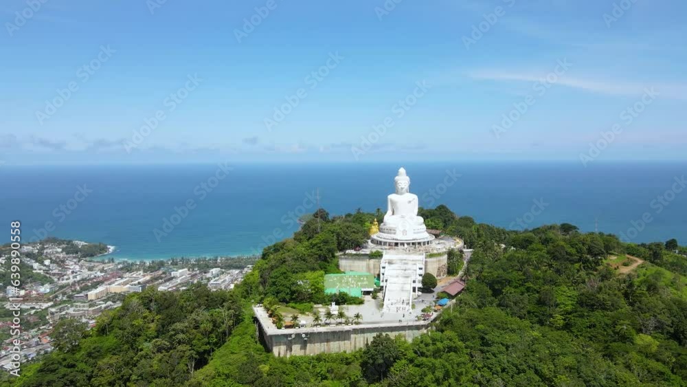 Drone Video Morning light sky and blue ocean at the back of the Big Buddha Phuket The Big Buddha Phuket is one of the landmarks on the island of Phuket Thailand. Drone Video Morning light sky and blue ocean at the back of the Big Buddha Phuket The Big Buddha Phuket is one of the landmarks on the island of Phuket Thailand.