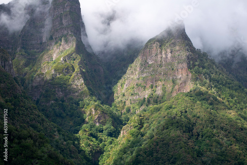 Mountain range in the fog. Fog in the mountains. island of Madeira. Mountain peaks.