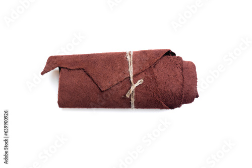 Leather rolled up piece isolated on white background. Top view.