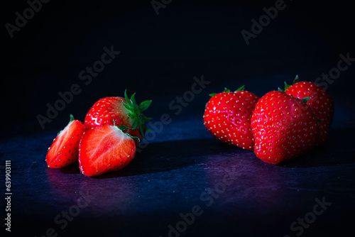 strawberries on a black background