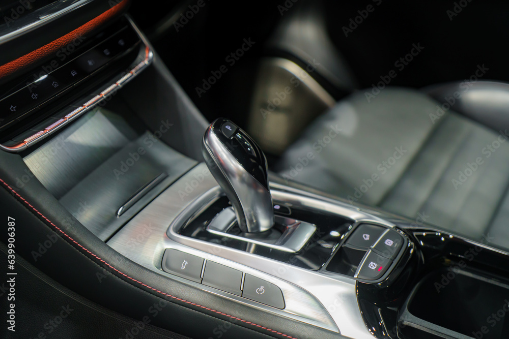 Close up of Modern car automatic gearbox and control buttons in EV car