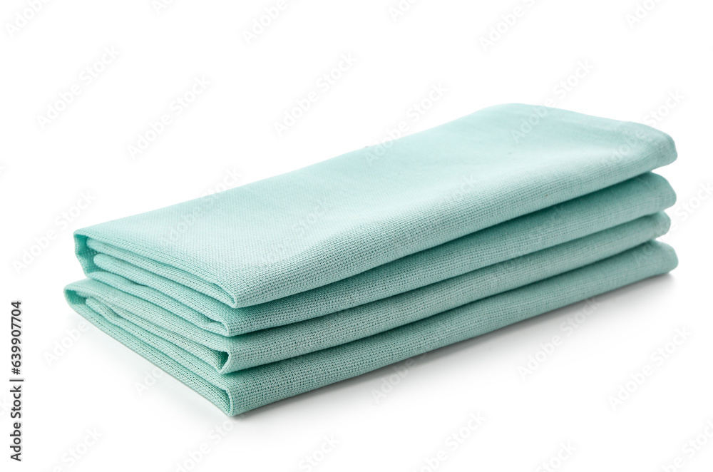 Folded clean napkins isolated on white background Folded clean napkins isolated on white background