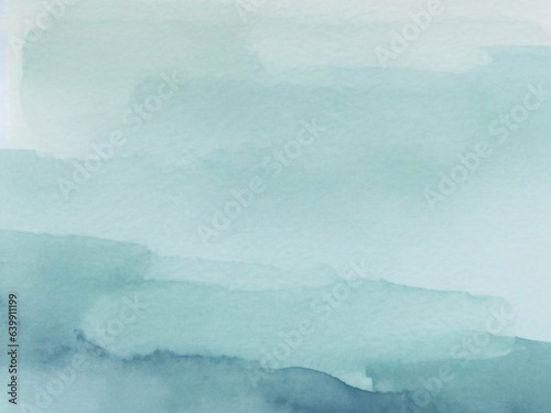 watercolor wash in serene shades of blue-green