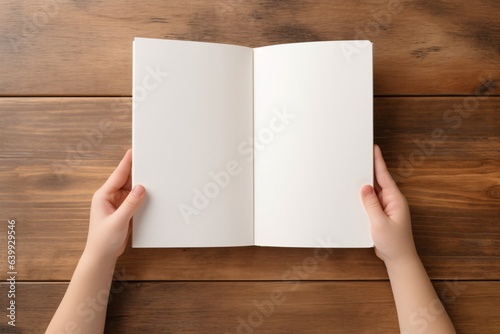 Book Mockup in Kid's Hands Holding Top View on Wood Table Background Children's Book Scene Mockup