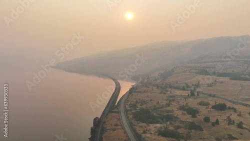 Smoke from seasonal wildfires hover over the the Columbia River Gorge, a federally protected scenic area forming the boundary between Washington and Oregon.  photo