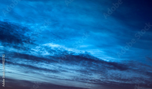 Noctilucent clouds at twilight © yauhenka