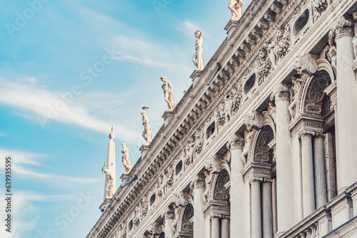 Architecture detail with the facade of the Marciana National Library (Biblioteca nazionale Marciana) located in Palazzo della Libreria in Venice. photo