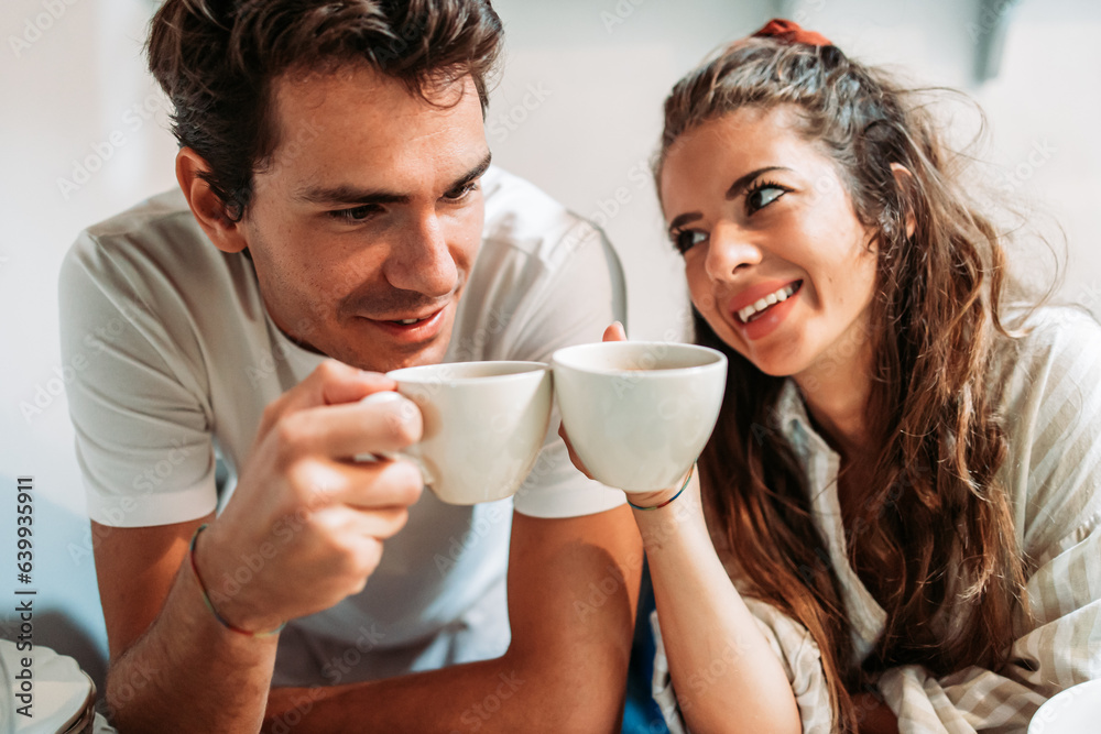 Young couple drinking a coffee in the morning Young couple drinking a coffee in the morning