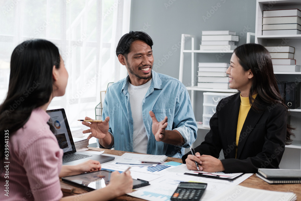 Group of Asian business people team meeting in modern office working design planning and ideas concept Group of Asian business people team meeting in modern office working design planning and ideas concept
