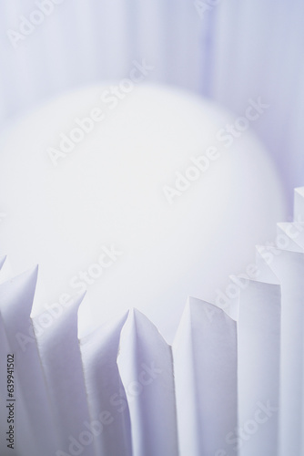 Zig Zag Folded paper with white orb glowing high key