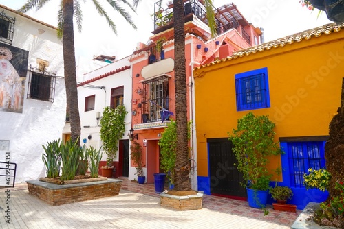 Plaza Santo Cristo with colorful old houses in the old town of Marbella, Costa del Sol, Málaga, Andalusia, Spain