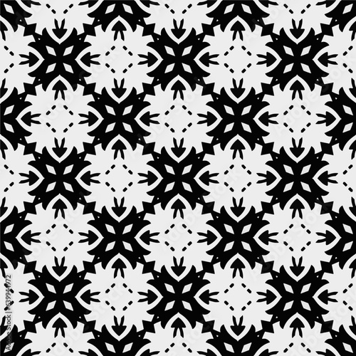 White background with black pattern. Seamless texture for fashion, textile design, on wall paper, wrapping paper, fabrics and home decor. Simple repeat pattern. 