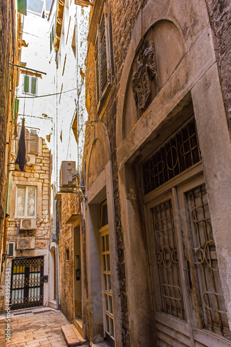Historic residential buildings in a quiet back street in the city of Split in Croatia