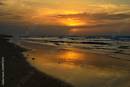 Fototapeta Naklejka Na Ścianę i Meble -  West Africa. Senegal. A picturesque crimson sunset on the Atlantic Ocean.