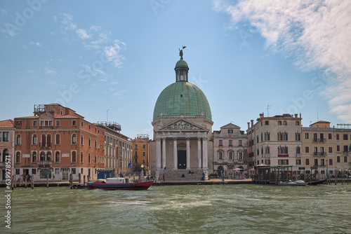 View of one of the canals of Venice on a sunny day.