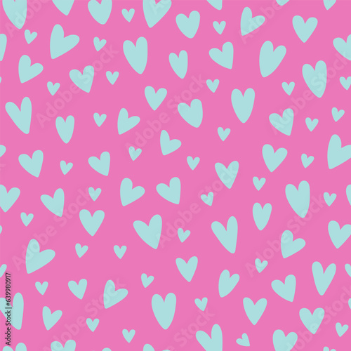 Hand drawn doodle hearts on a background seamless pattern. Valentine`s day theme.Vector illustration.