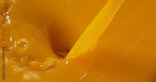Orange Juice being poured