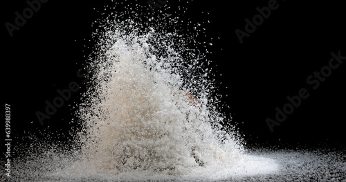 Fototapeta Naklejka Na Ścianę i Meble -  Coconut, cocos nucifera, Powder falling against Black Background
