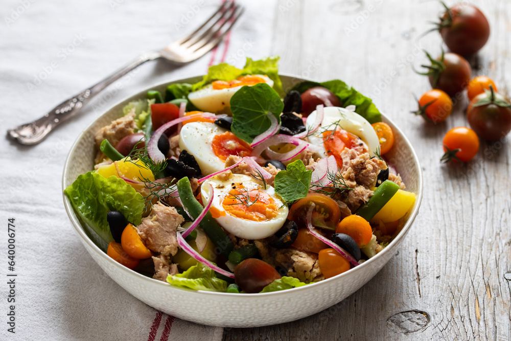 Salad nicoise with boiled eggs and tuna