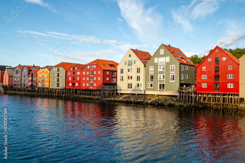 Fjord embankment with colorful wooden houses in Trondheim city, Norway. © Jan