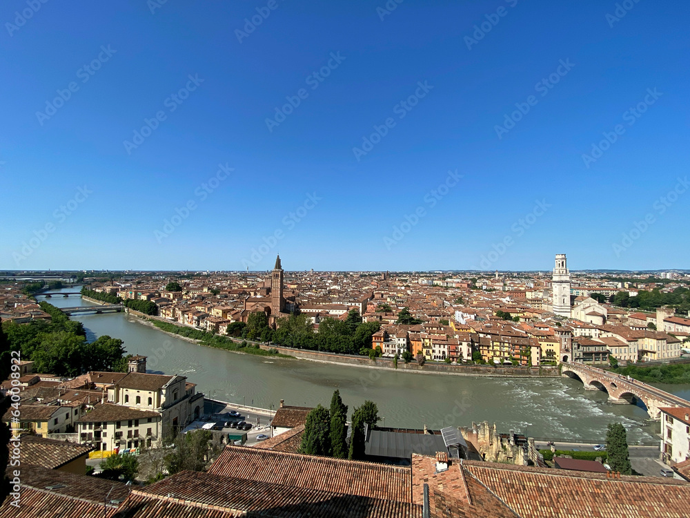 view of Verona, a city in Italy on a sunny day with the river Adige