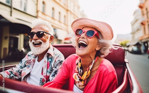 Senior couple travel and have fun together, drive a convertible car