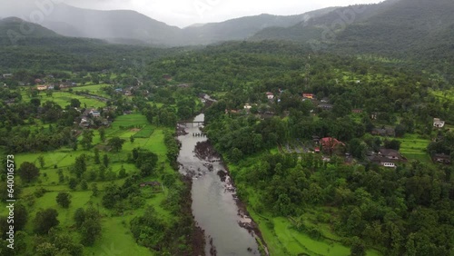 Drone view of River passing through rural village in maharashtra photo