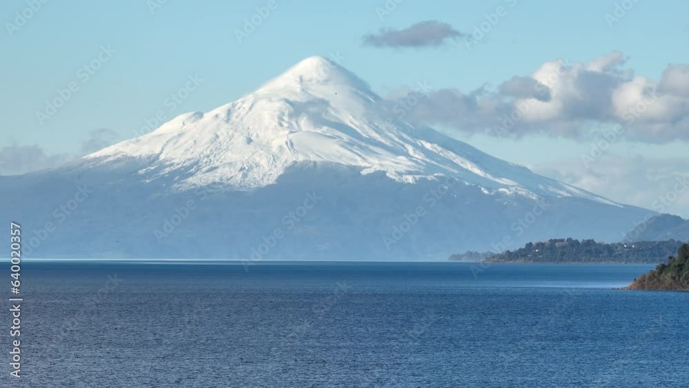 Osorno Volcano At Puerto Varas In Los Lagos Chile. Volcano Landscape. Bay Water Background. Los Lagos Chile. Snow Capped Mountain. Osorno Volcano At Puerto Varas In Los Lagos Chile. Osorno Volcano At Puerto Varas In Los Lagos Chile. Volcano Landscape. Bay Water Background. Los Lagos Chile. Snow Capped Mountain. Osorno Volcano At Puerto Varas In Los Lagos Chile.