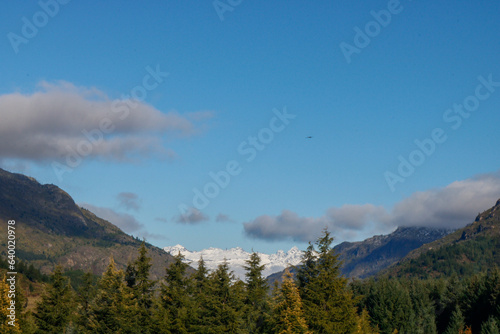 Fototapeta Naklejka Na Ścianę i Meble -  beautiful view of the mountains in nature, snow and greenery. Tranquility, travel to amazing places