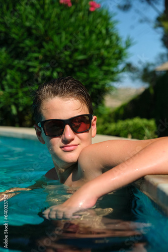 Portrait of a boy in a swimming pool