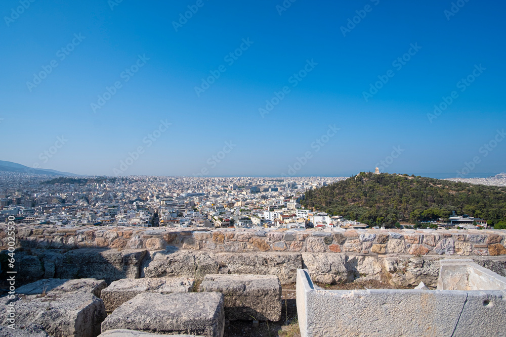 Athens skyline cityscape seen from the Acropolis on a blue summer sky