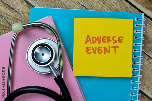 Quadro em tela Concept of Adverse Event write on sticky notes with stethoscope isolated on Wooden Table