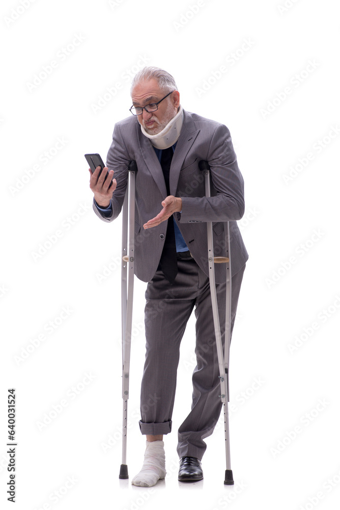 Old businessman after car accident isolated on white Old businessman after car accident isolated on white