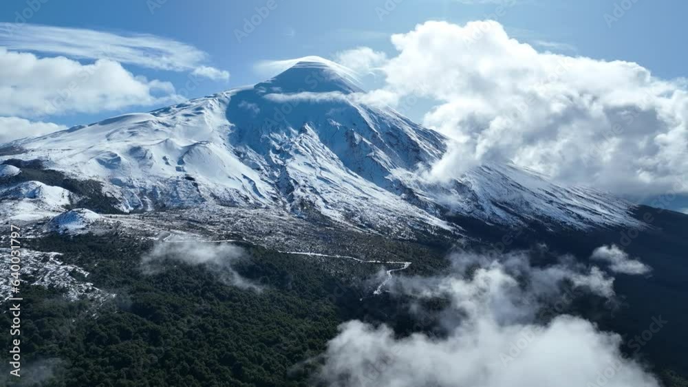 Osorno Volcano At Llanquihue In Los Lagos Chile. Volcano Landscape. Sky Clouds Background. Los Lagos Chile. Snow Capped Mountain. Osorno Volcano At Llanquihue In Los Lagos Chile.