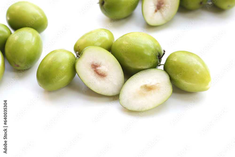 Green jujube fruits on white background. Green jujube fruits on white background.