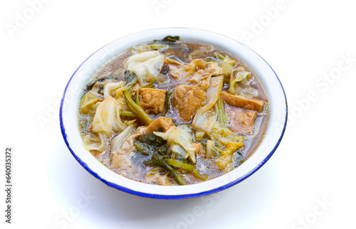 Mixed vegetable stew with tofu in white bowl (Tom Jub Chai)