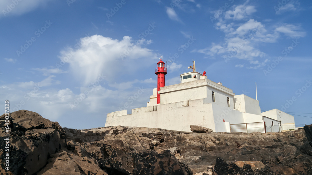 Coastal landscape next to the historic lighthouse of cabo raso in cascais, portugal