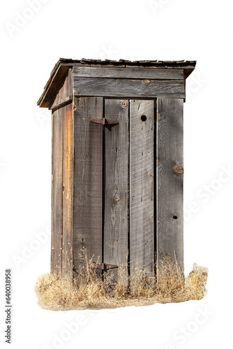 Old wood outhouse with a tin roof