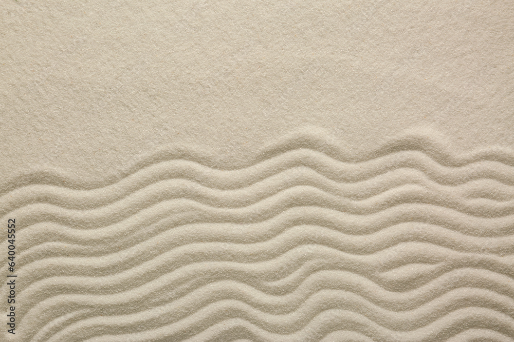 White sand with pattern as background, top view. Zen concept White sand with pattern as background, top view. Zen concept