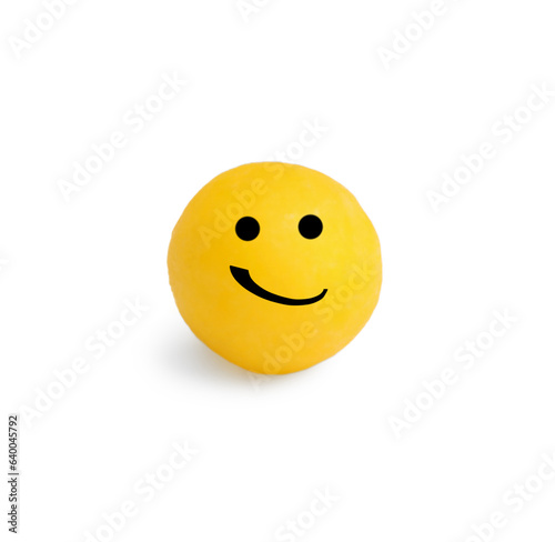 Orange pill with grinning face on white background